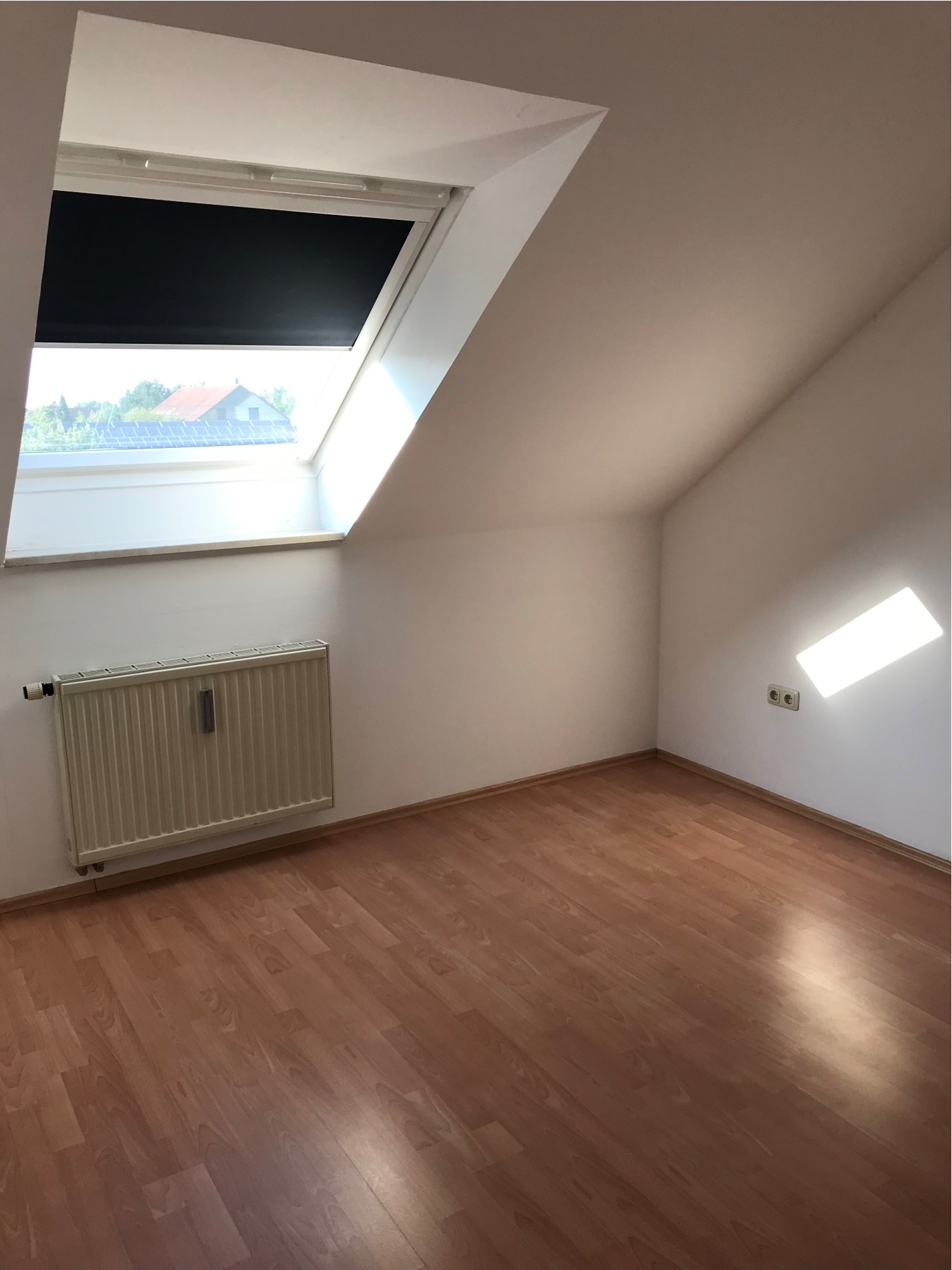 Schlafzimmer mit Dachflächenfenster